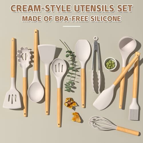 Cream-style utensils set with wooden handles.