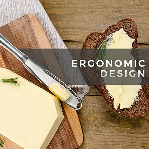 Butter spreader knife with ergonomic design on bread and butter.