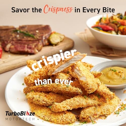 Crispy chicken strips with dipping sauce and steak in background.