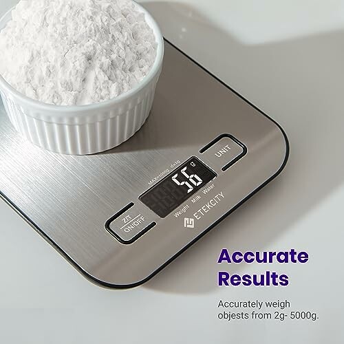 Digital kitchen scale weighing a bowl of powder.