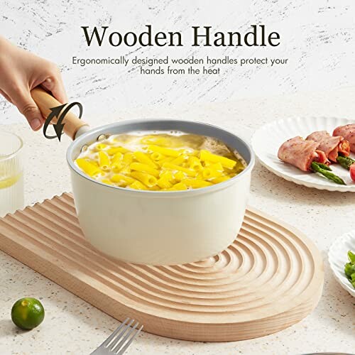 Person holding pot with wooden handle on table with food.